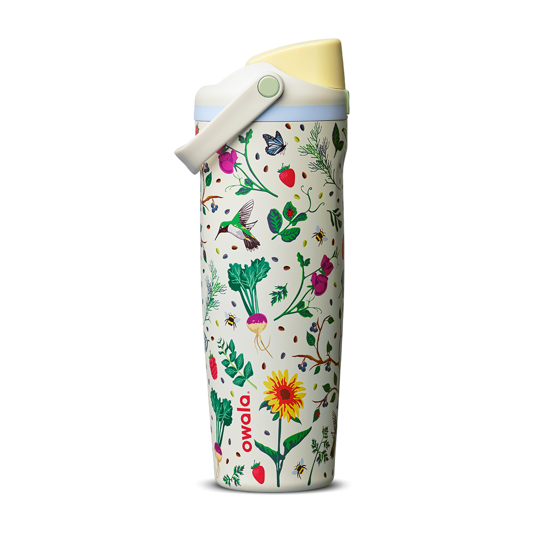 FreeSip Sway 30oz Mother's Day Garden; cream white body with colorful garden print featuring flowers, strawberries, hummingbirds, and bees, yellow flip cap, and light blue carry loop