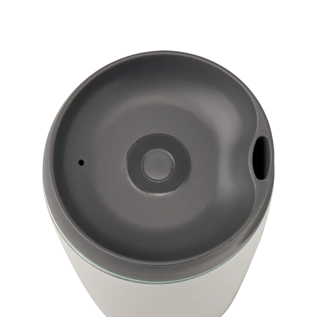 Owala SmoothSip 12oz in white body with gray lid and mint green accent ring, top view